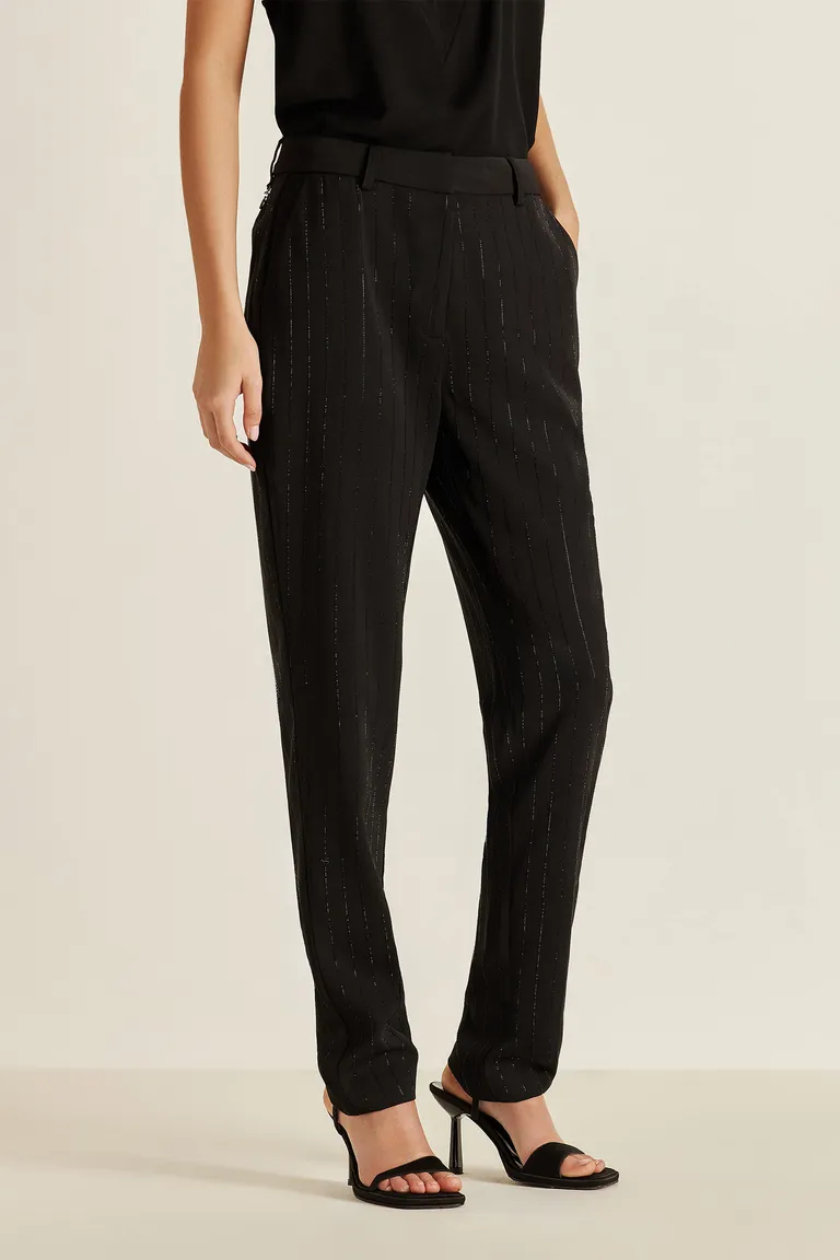 Pantalón negro de tela liviana con detalles de strass exclusivos de Tucci en Pantalones para argentina