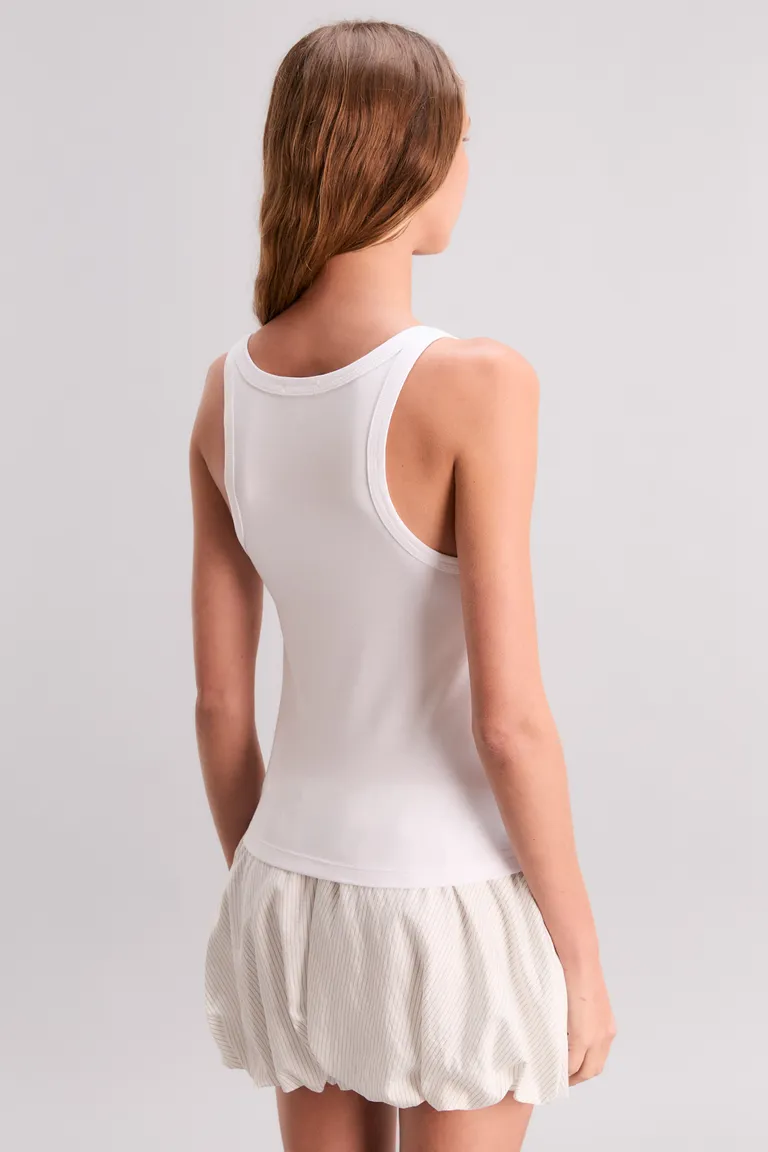 Musculosa deportiva con estampado de estrella brillante en color blanco de Kosiuko en Remeras para argentina