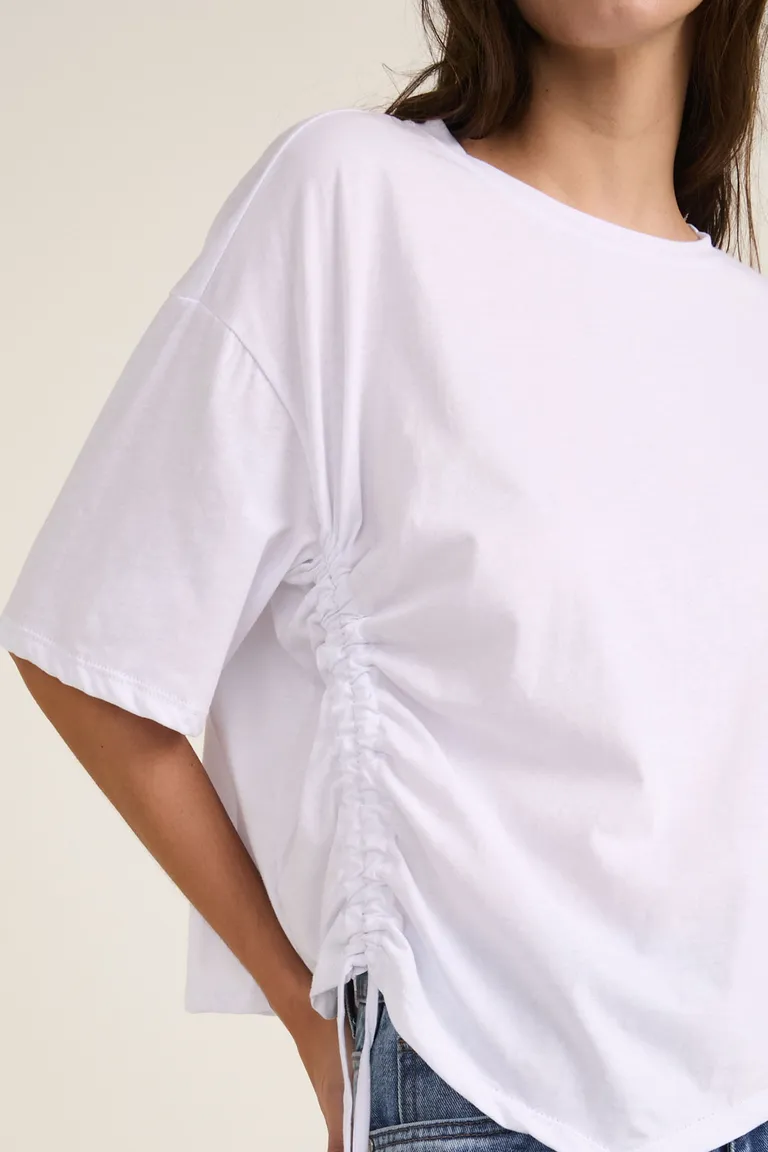 Remerón con cuello redondo mangas al codo y jareta lateral para mujer de Cuesta Blanca en Remeras para argentina