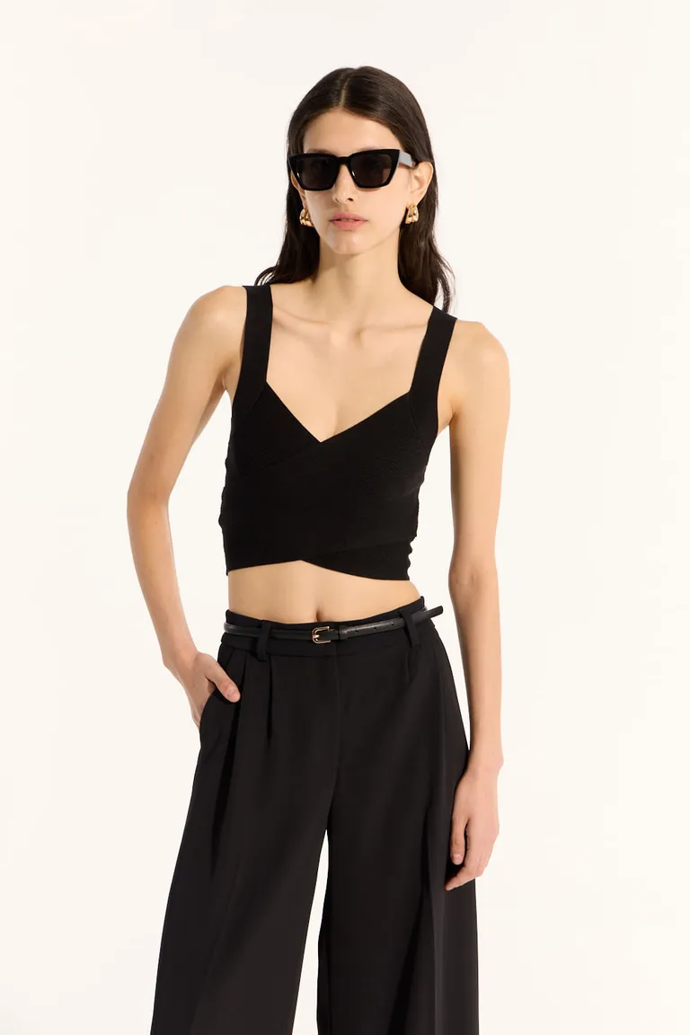 Top cruzado negro de punto con diseño ajustado y detalle de piezas entrecruzadas de Portsaid en Tops para argentina