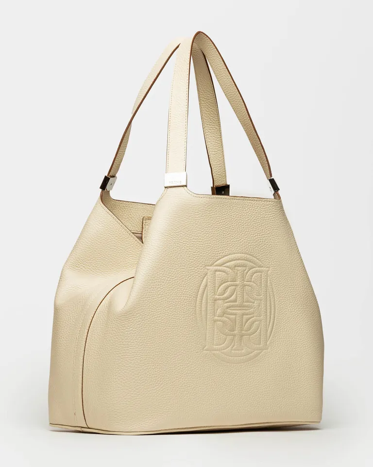 Bolso eterial en cuero graneado: Diseño minimalista y funcional de Prüne en Bolsos y Carteras para argentina