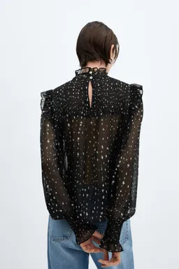 Blusa estampada con volantes de Mango en Blusas para argentina