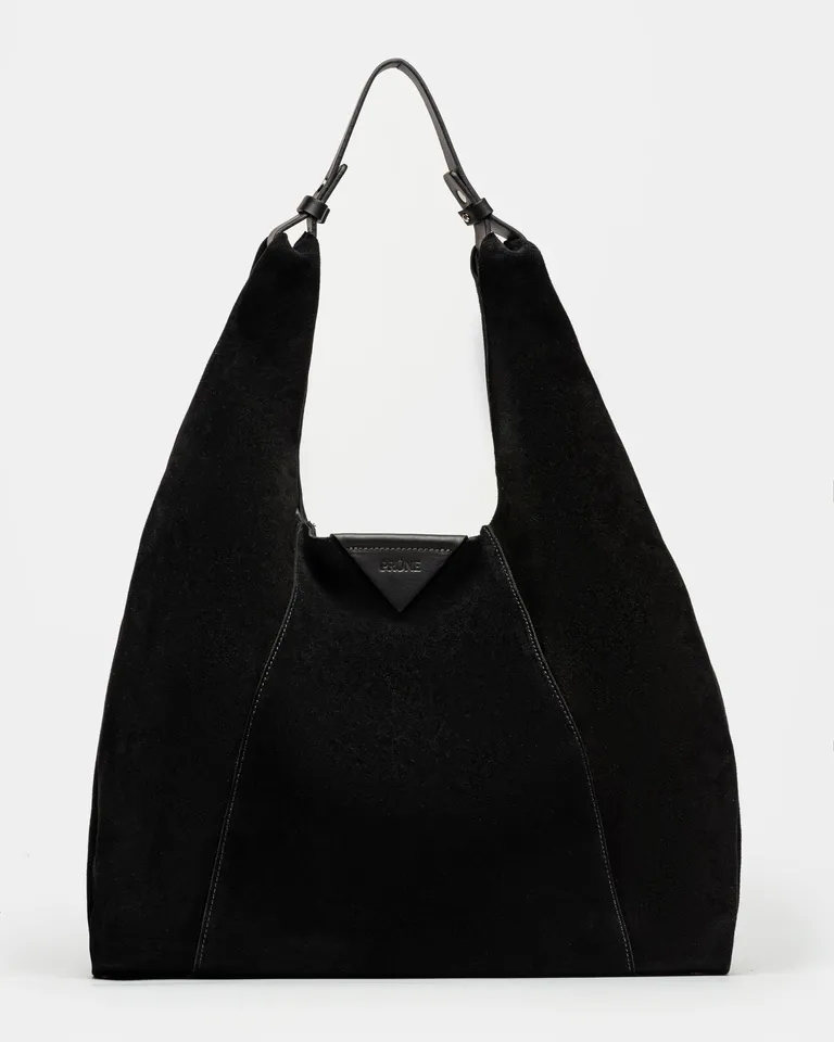 Bolso negro de gamuza con asa de cuero, ideal para llevar en el día a día de Prüne en Bolsos y Carteras para argentina
