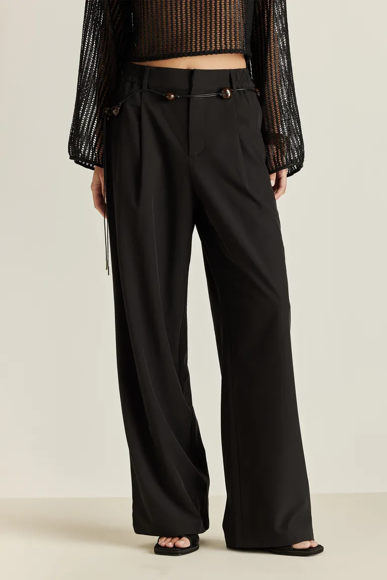 Pantalón negro de tela ligera con cintura elástica, elegante y confortable de Tucci en Pantalones para argentina