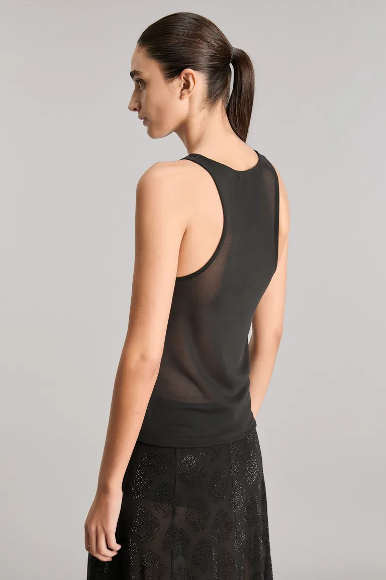 Musculosa slim de tul translúcido con diseño exclusivo de la colección de Kosiuko en Tops para argentina