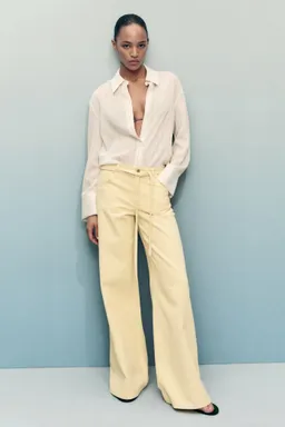 Jeans wideleg tiro bajo cinturón de Mango en Pantalones para argentina