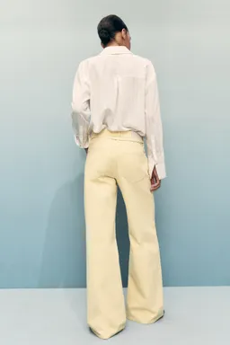 Jeans wideleg tiro bajo cinturón de Mango en Pantalones para argentina