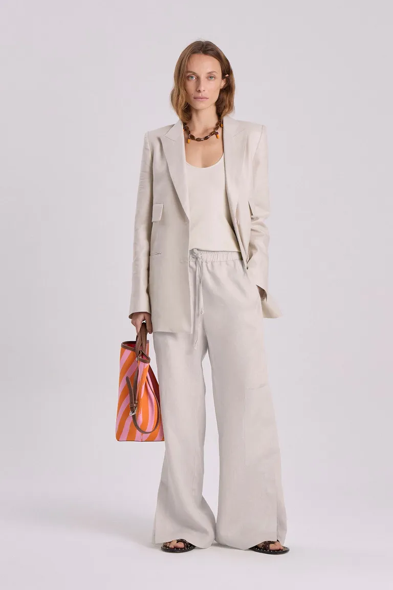 Pantalón de lino de corte relajado y recto con cintura elástica y tajos en bota de Maria Cher en Pantalones para argentina