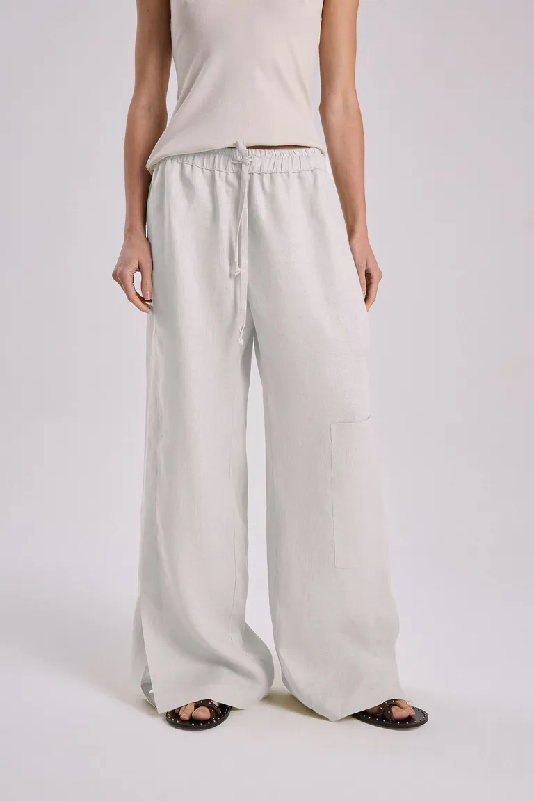 Pantalón de lino de corte relajado y recto con cintura elástica y tajos en bota de Maria Cher en Pantalones para argentina