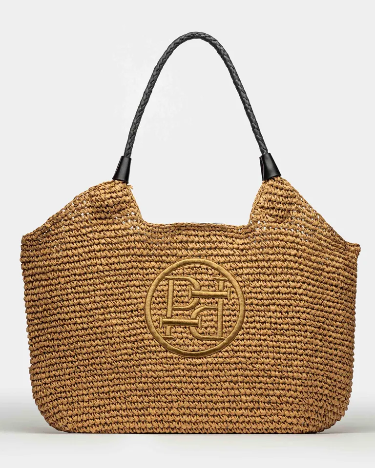 Bolso de playa de raffia con detalles en cuero negro y herrajes en bronce de Prüne en Bolsos y Carteras para argentina