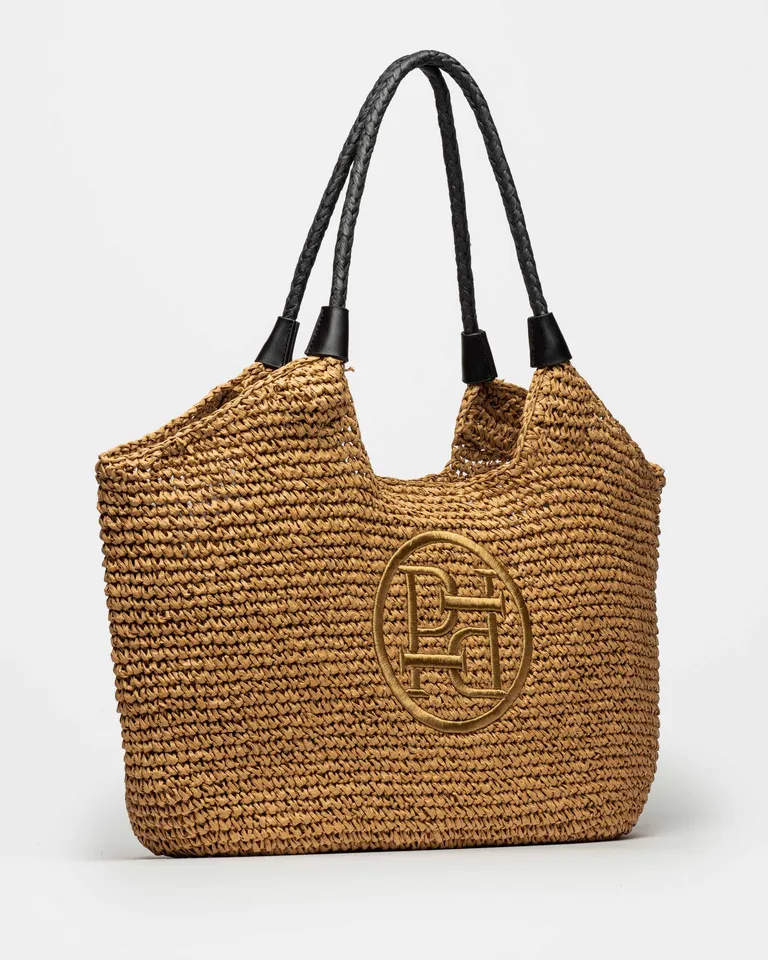 Bolso de playa de raffia con detalles en cuero negro y herrajes en bronce de Prüne en Bolsos y Carteras para argentina
