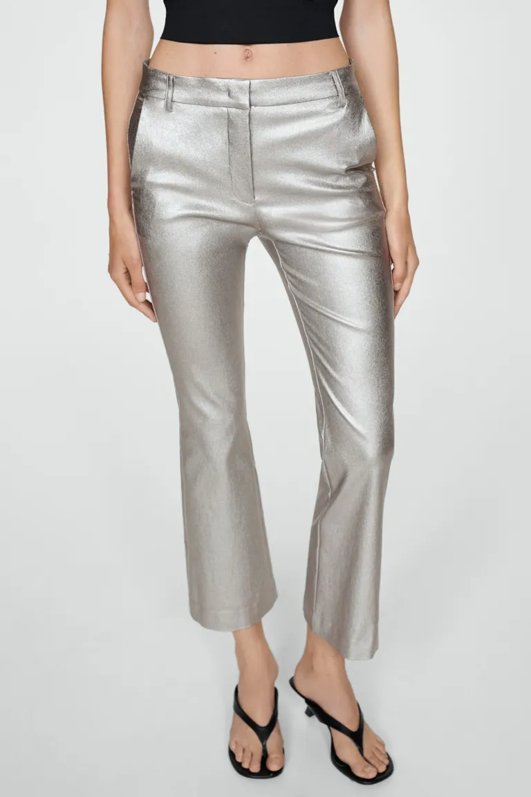Pantalón flare metalizado de Mango en Pantalones para argentina