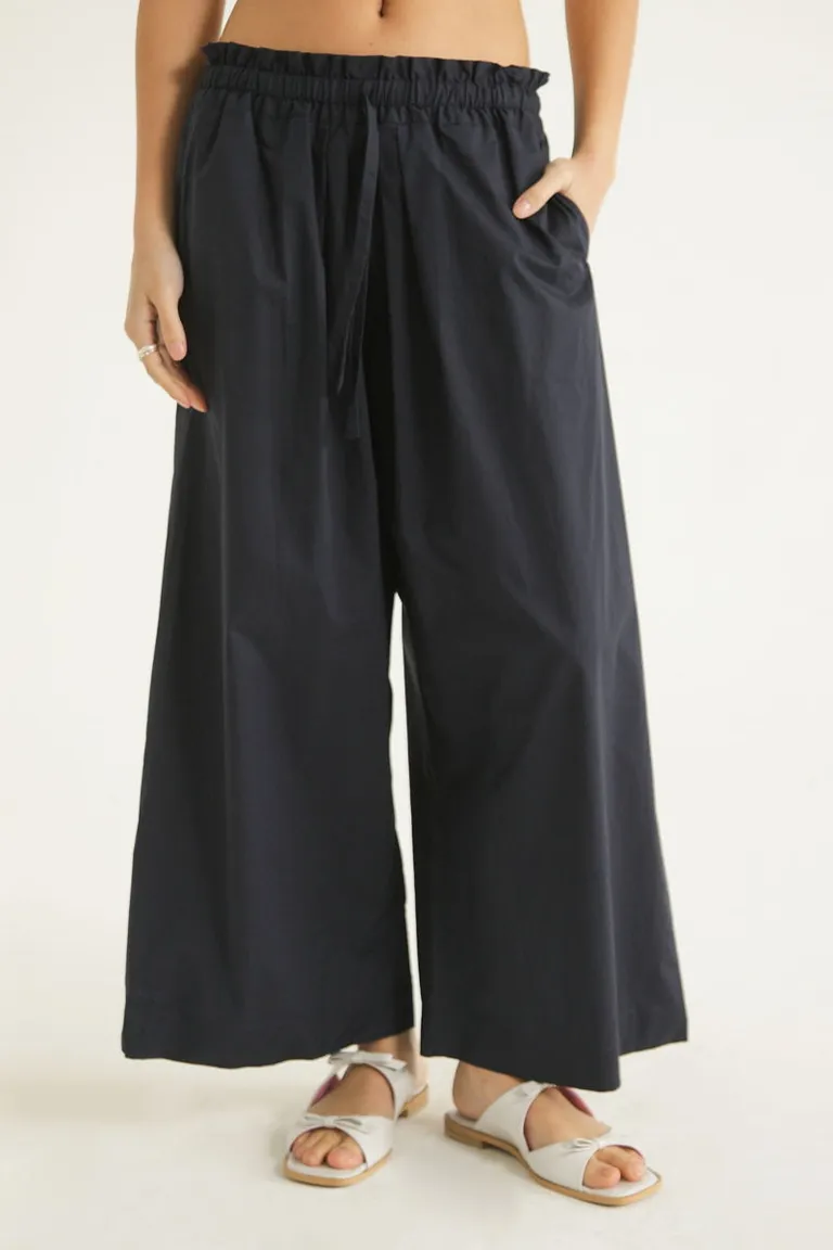 Pantalones anchos de tiro alto con cintura elástica y logo bordado de Las Pepas en Pantalones para argentina