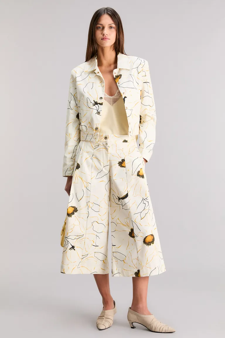 Pantalón floral de largo midi con diseño estampado y corte recto para un look elegante y moderno de Kosiuko en Pantalones para argentina