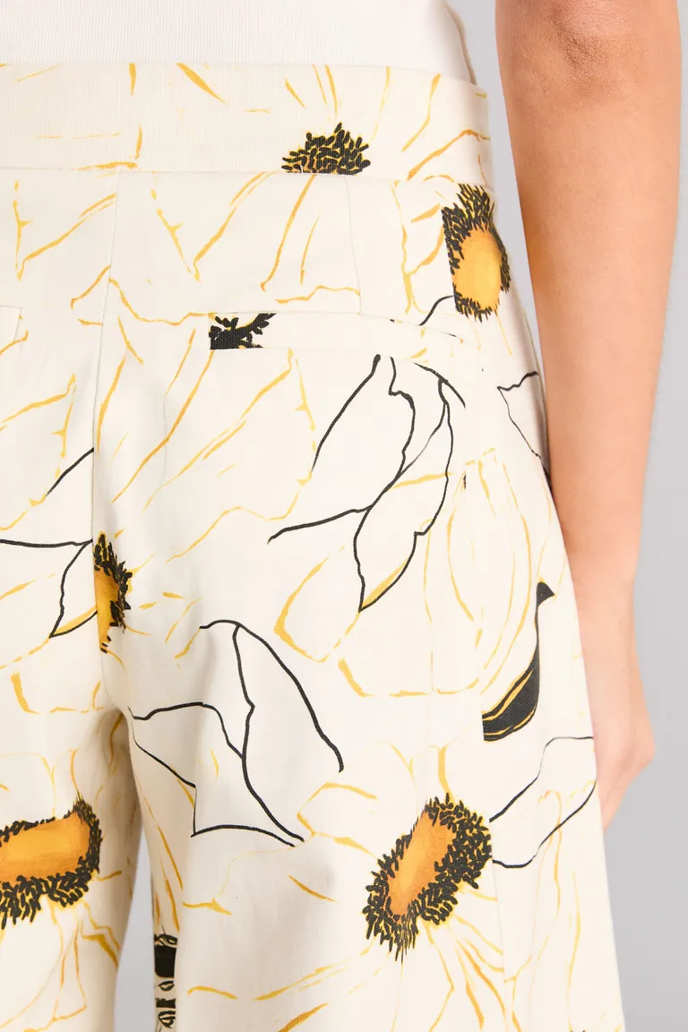 Pantalón floral de largo midi con diseño estampado y corte recto para un look elegante y moderno de Kosiuko en Pantalones para argentina
