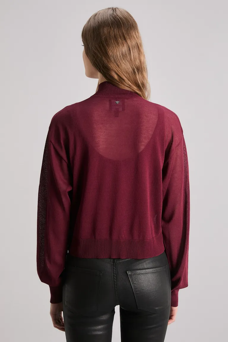 Bomber de punto transparente con cuello alto y cierre central de Kosiuko en Buzos y Sweaters para argentina