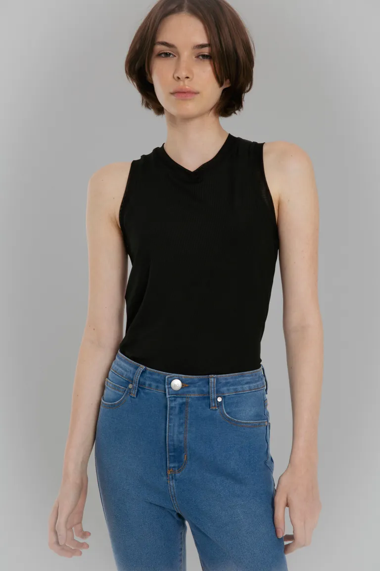 Pantalón chupín de denim con corte ajustado y lavado medio de Naíma en Pantalones para argentina