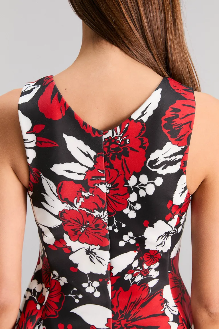 Top con corte peplum y estampado floral exclusivo para un look femenino y elegante de Kosiuko en Tops para argentina