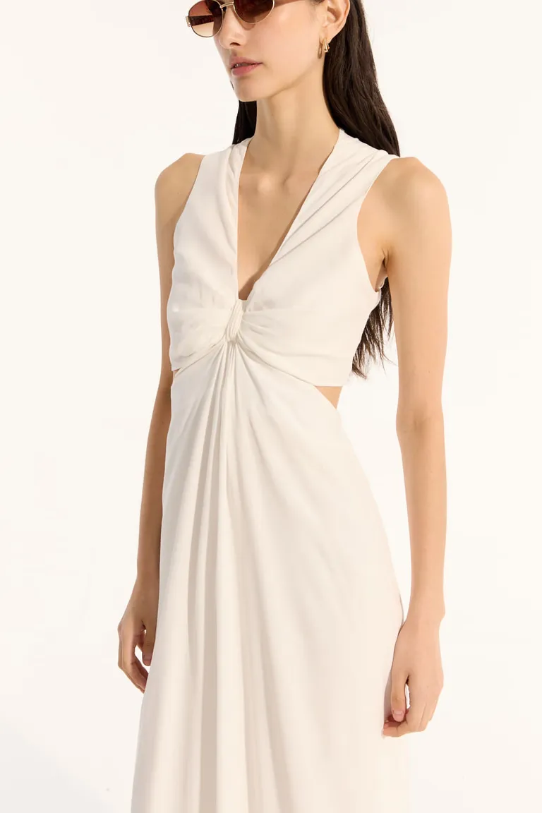 Vestido creppe ravenna sin mangas con diseño de nudo en busto y volado en ruedo de Portsaid en Vestidos para argentina