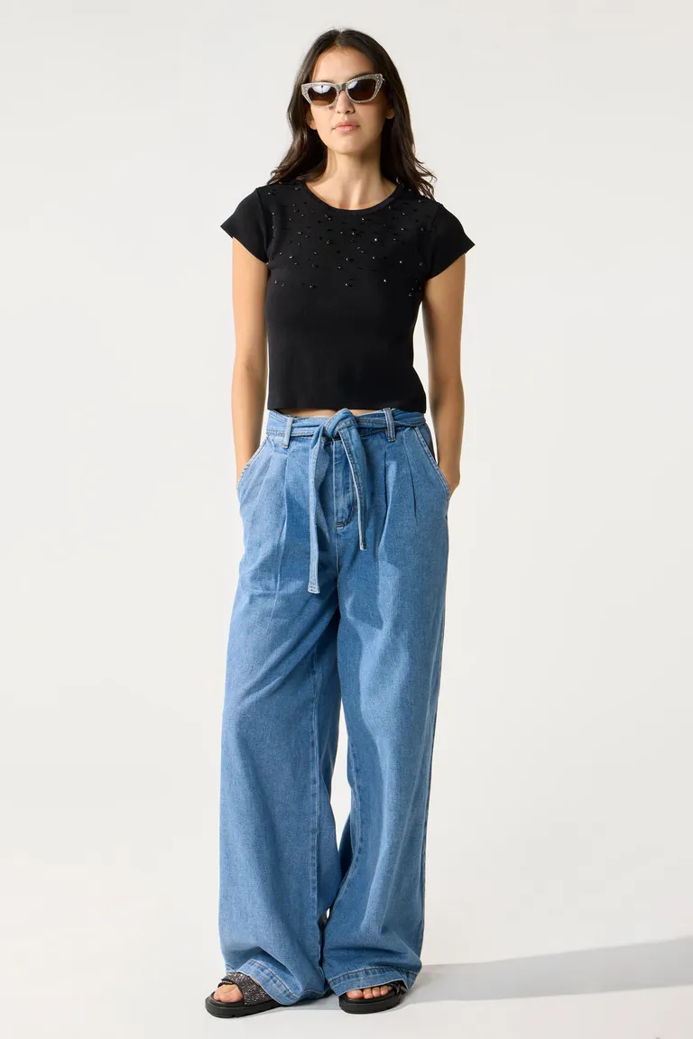 Pantalón de denim de tiro alto y pierna ancha con lazo en la cintura de Cuesta Blanca en Pantalones para argentina