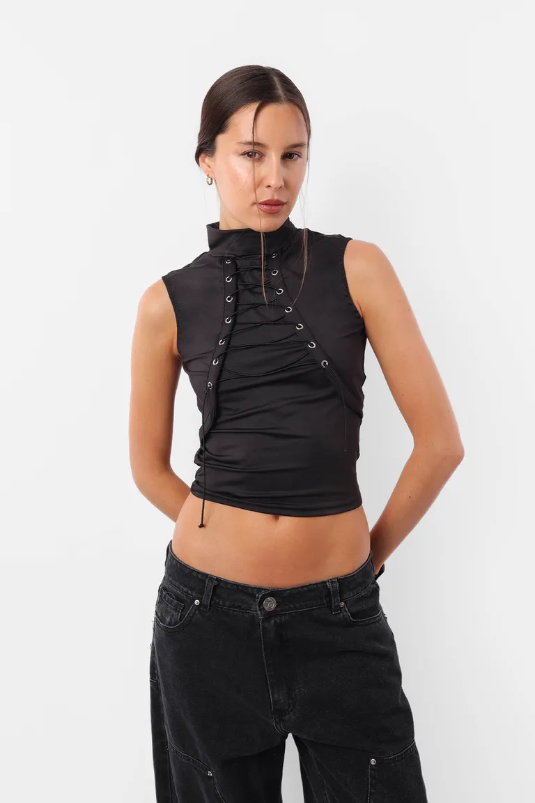 Top de microfibra sin mangas con cuello medio y detalles metálicos de Top White en Tops para argentina