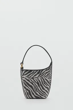 Bolso balde estampado cebra de Mango en Bolsos y Carteras para argentina