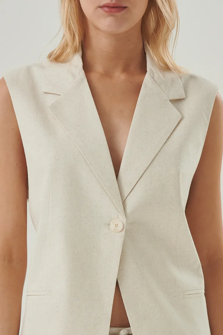Chaleco sin mangas de diseño clásico con solapa y botón frontal para looks modernos y relajados de Sweet en Chalecos para argentina