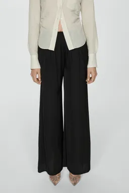 Pantalón fluido wideleg de Mango en Pantalones para argentina