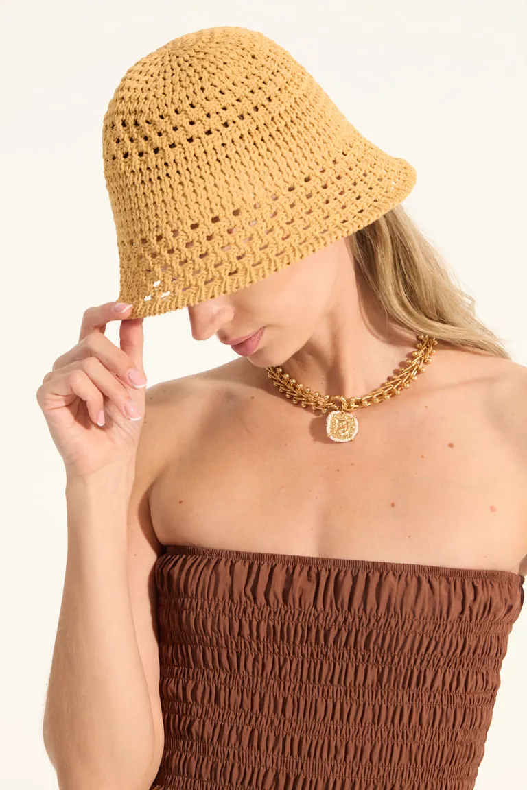 Gorro de crochet estilo piluso en color amarillo para mujer de Portsaid en Gorros y Sombreros para argentina