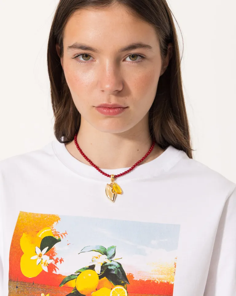 Collar con dije de beso de piedras naturales y detalles en bronce de Jazmin Chebar en Bijouterie para argentina