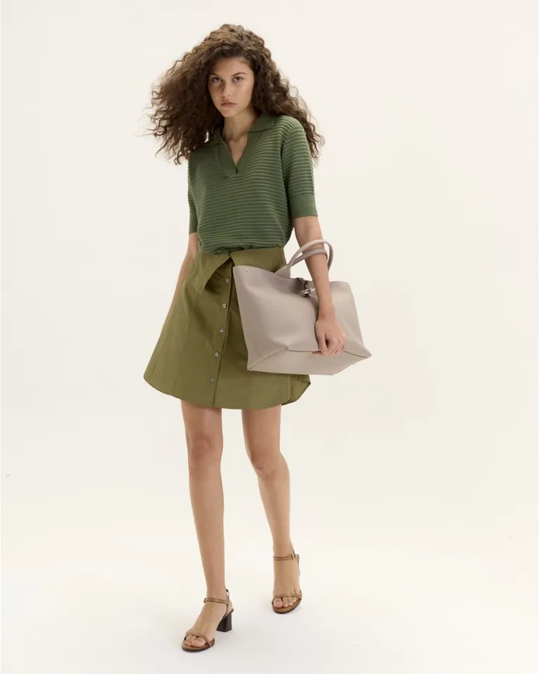 Falda corta de diseño con recortes y bolsillo frontal con lazo de Blue Sheep en Faldas para argentina