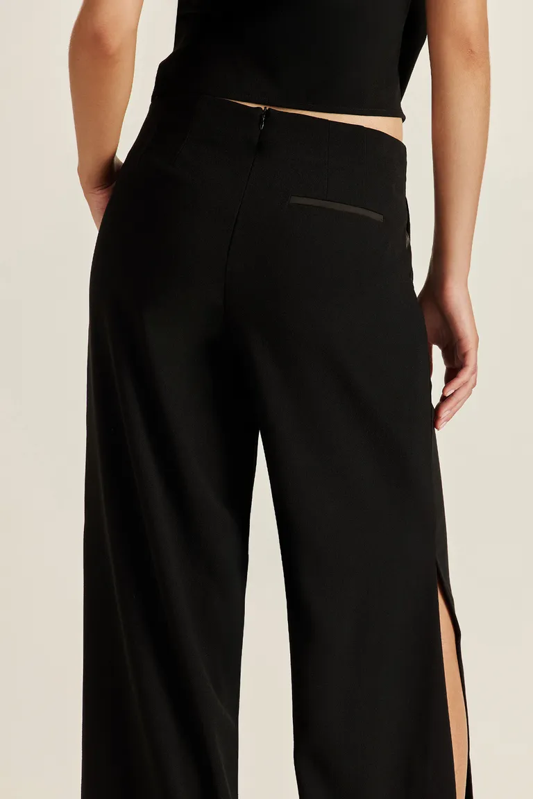 Pantalón sastre negro con detalle de satén - Diseño elegante y fluido de Tucci en Pantalones para argentina