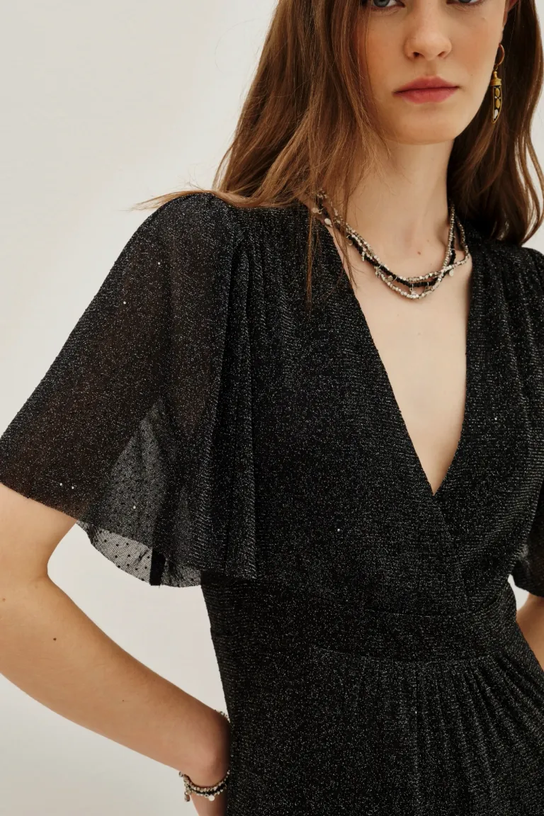 Vestido largo con escote en V, mangas al codo y falda con volados escalonados de Rapsodia en Vestidos para argentina