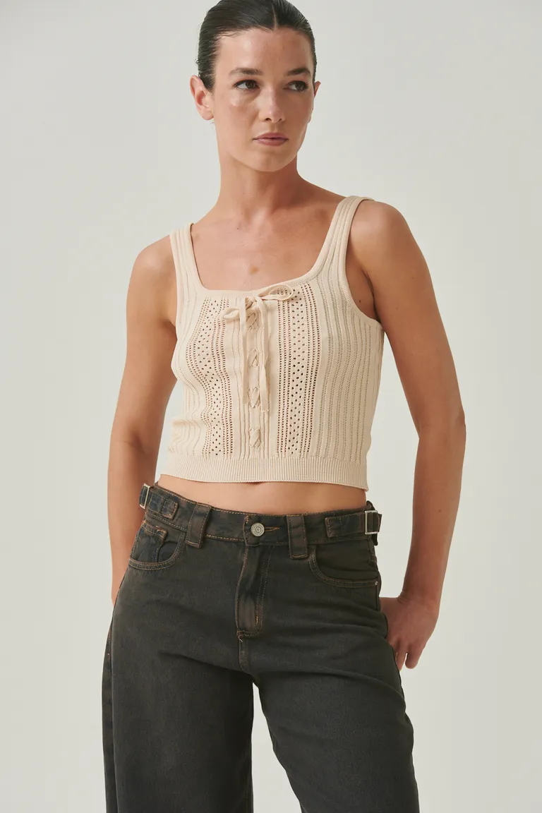Top femenino de hilo con diseño calado y lazo decorativo de Sweet en Tops para argentina