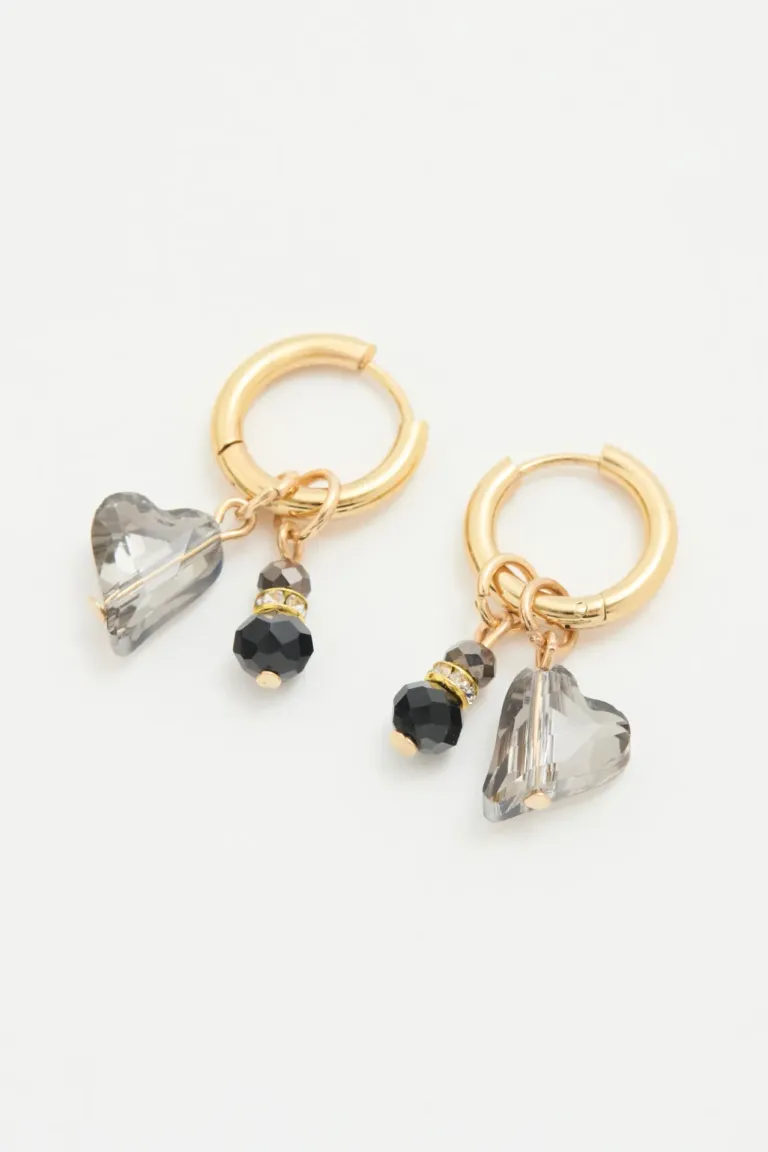 Elegantes pendientes tipo aro con corazón facetado y piedras grises de Rapsodia en Bijouterie para argentina