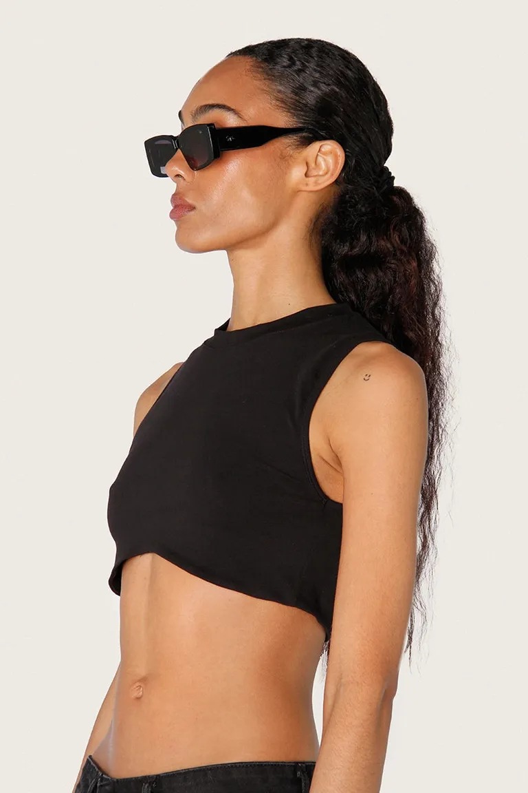 Top de jersey elástico negro con cuello y ruedo irregular de Sofia Sarkany en Tops para argentina