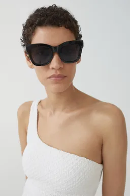 Traje baño asimétrico textura de Mango en Swimwear y Beachwear para argentina