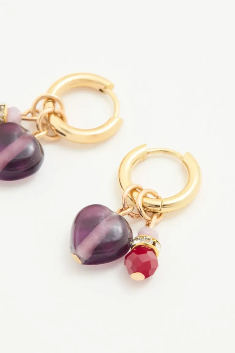 Aros argolla dorados con diseño de corazón facetados y piedras de Rapsodia en Bijouterie para argentina