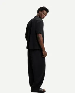 Pantalón baggy jogger plisado de Bershka en Pantalones para argentina