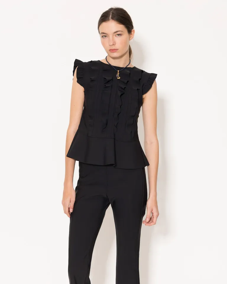 Top de diseño elegante y refinado con detalles fruncidos y escote en la espalda de Jazmin Chebar en Tops para argentina