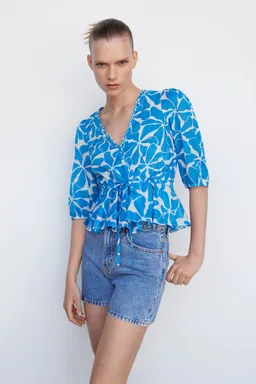 Blusa cruzada con lazo de Mango en Blusas para argentina