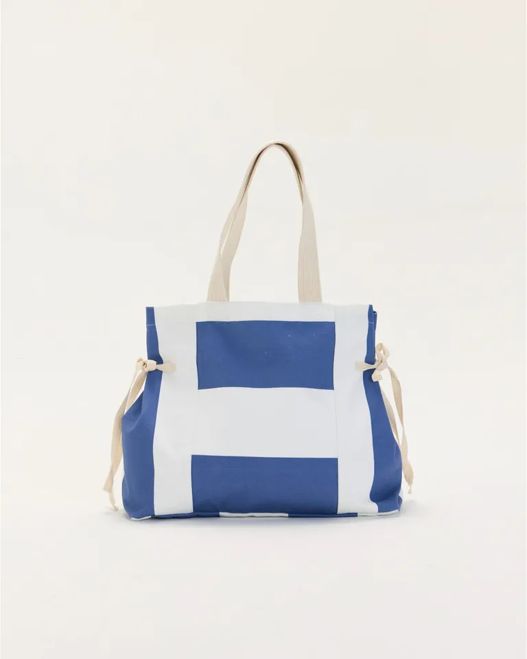Elegante bolso de lona en diseño a rayas, ideal para llevar a la playa o al trabajo de Blue Sheep en Bolsos y Carteras para argentina