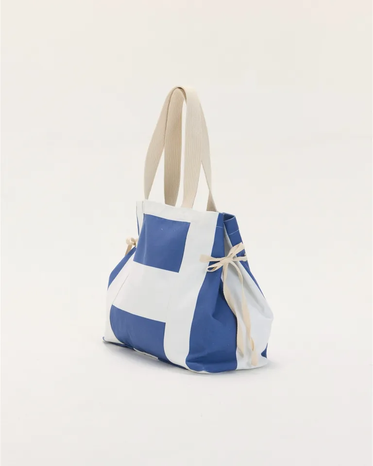 Elegante bolso de lona en diseño a rayas, ideal para llevar a la playa o al trabajo de Blue Sheep en Bolsos y Carteras para argentina
