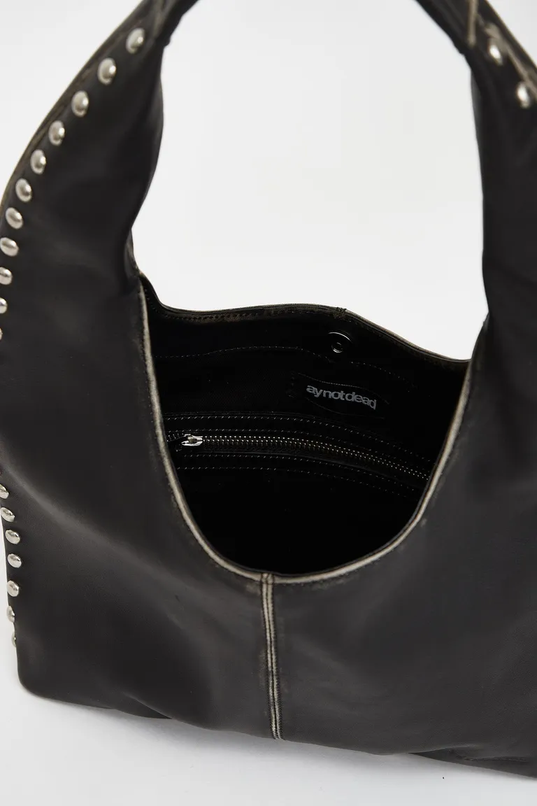 Cartera de cuero negra con tachas metálicas y logo grabado de Ay Not Dead en Bolsos y Carteras para argentina