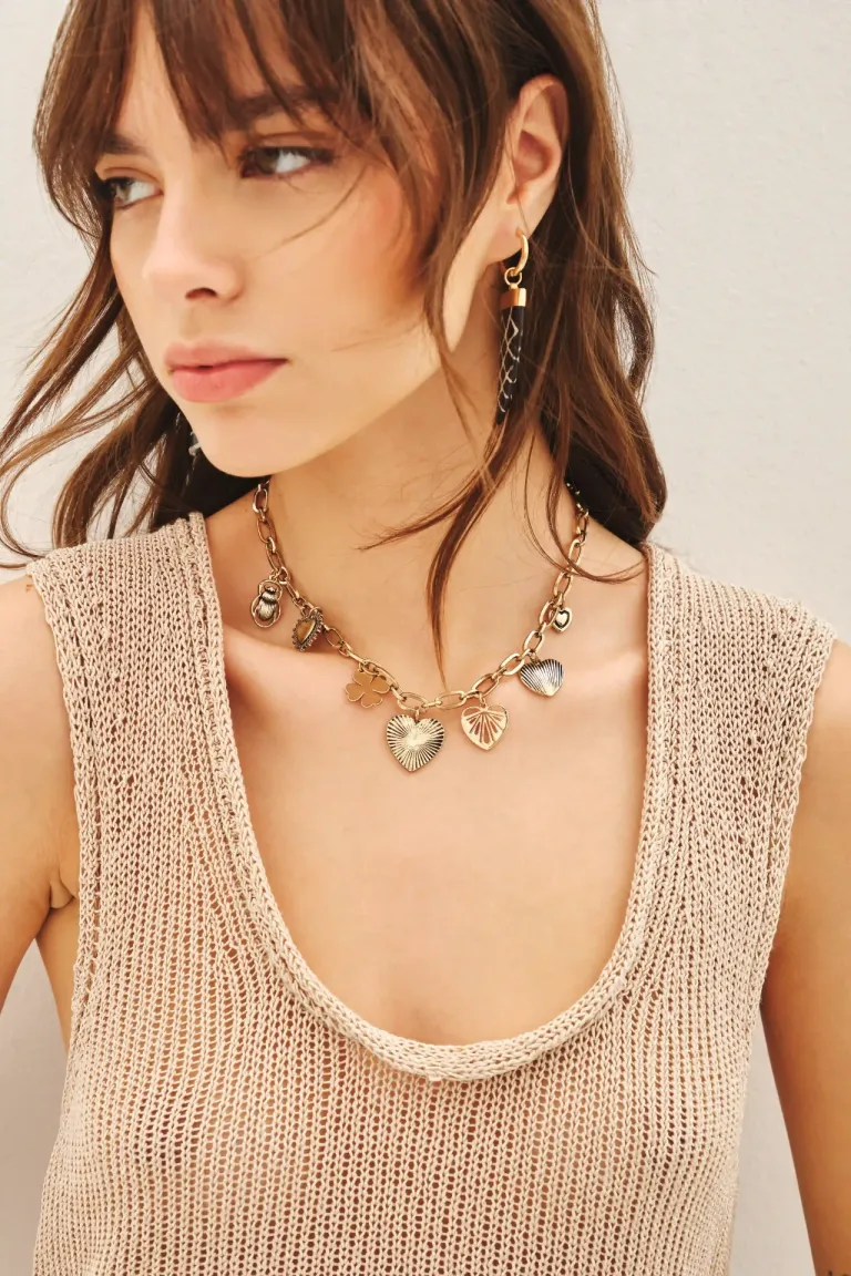 Collar cadena con dijes de corazones y detalles decorativos con extensor ajustable de Rapsodia en Bijouterie para argentina