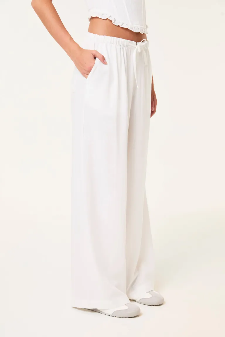 Pantalón de lino blanco de corte relajado con cintura elastizada y lazo ajustable de 47 Street en Pantalones para argentina