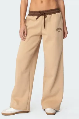 Pantalón buzo bordado contrastante de Edikted en Pantalones para argentina