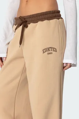 Pantalón buzo bordado contrastante de Edikted en Pantalones para argentina