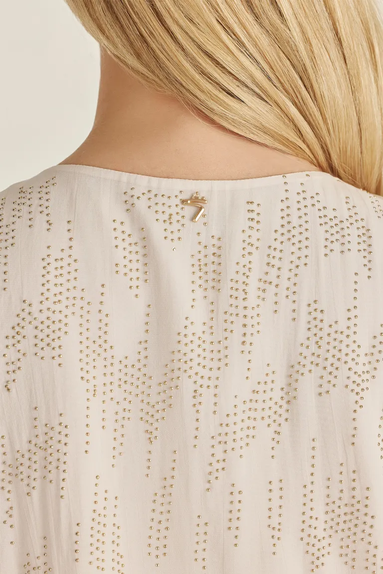 Chaleco de gasa crepé con tachas bombé, un diseño exclusivo y sofisticado de Tucci en Chalecos para argentina