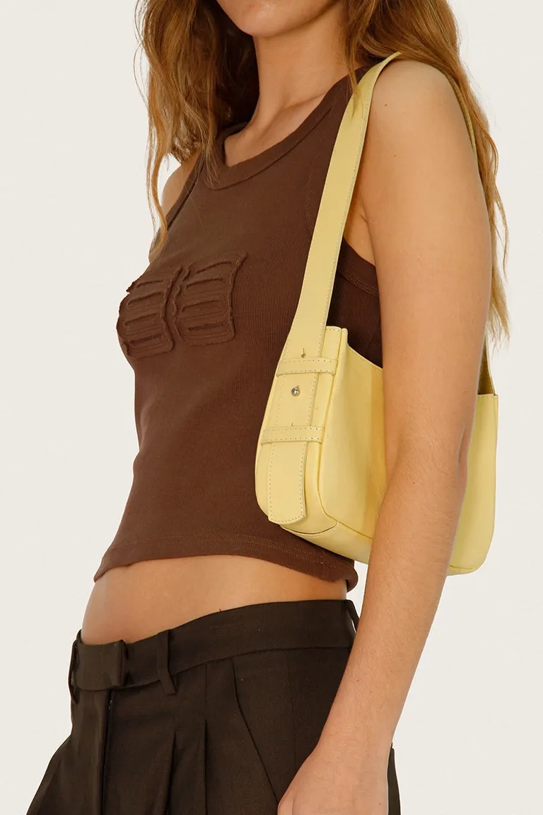 Musculosa marrón de morley elástico con logo - Prenda versátil y moderna para el día a día de Sofia Sarkany en Tops para argentina